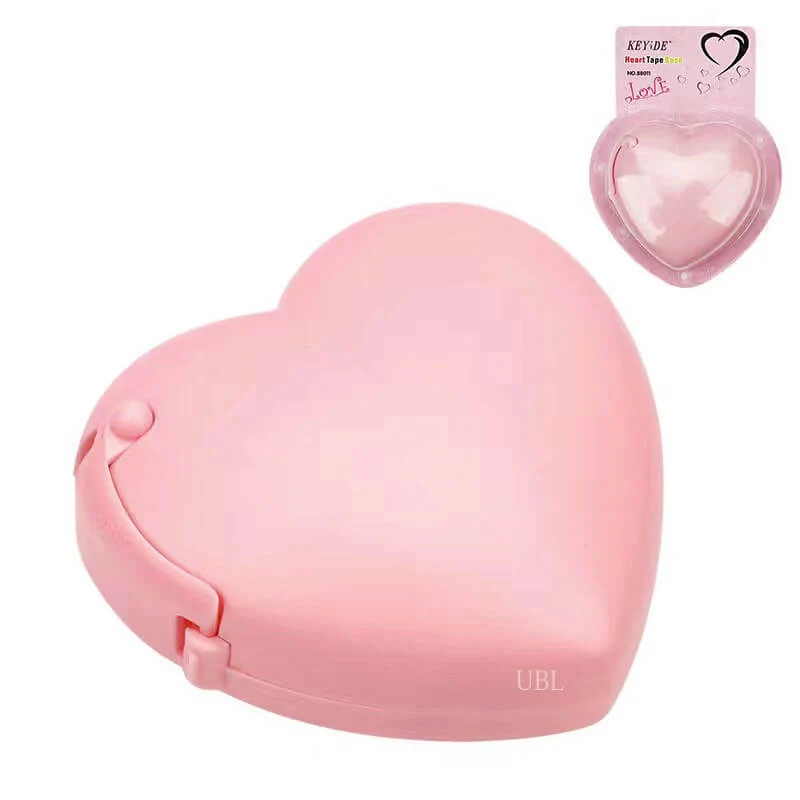 Coupe-ruban rose en forme de coeur