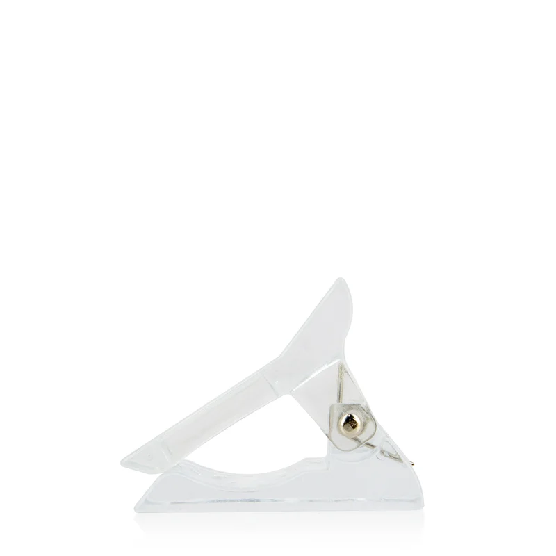 Pince de maintien pour capsule
