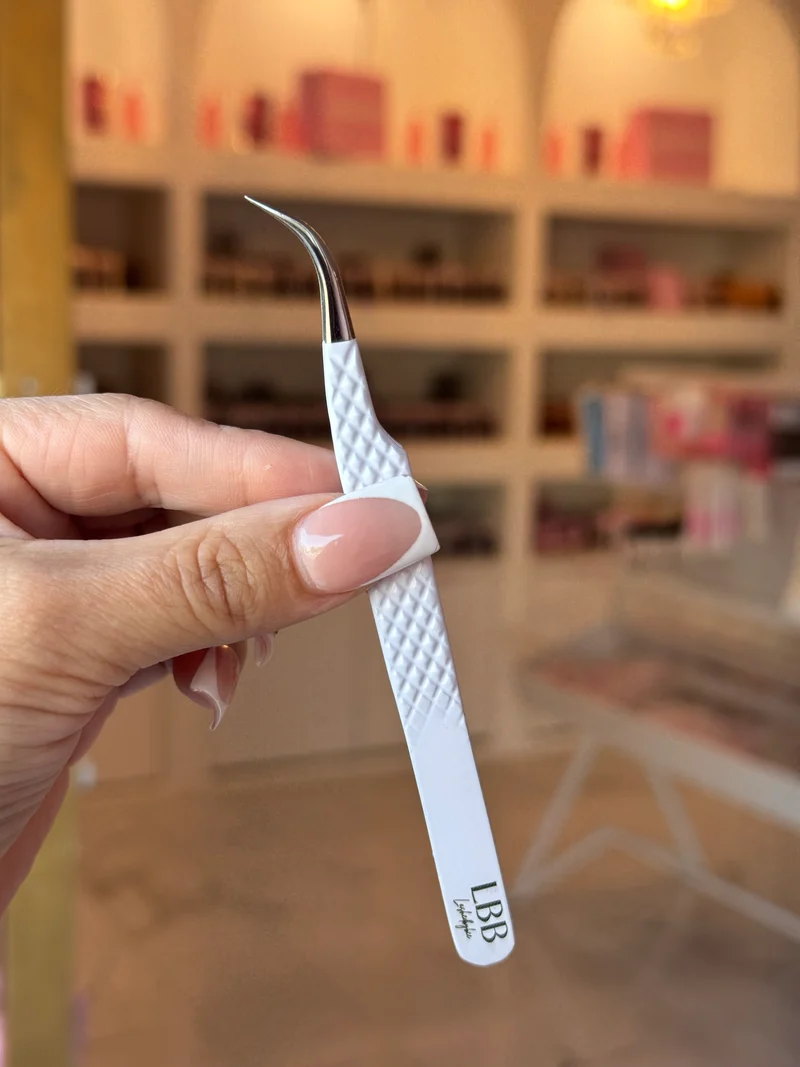 White J curve tweezer