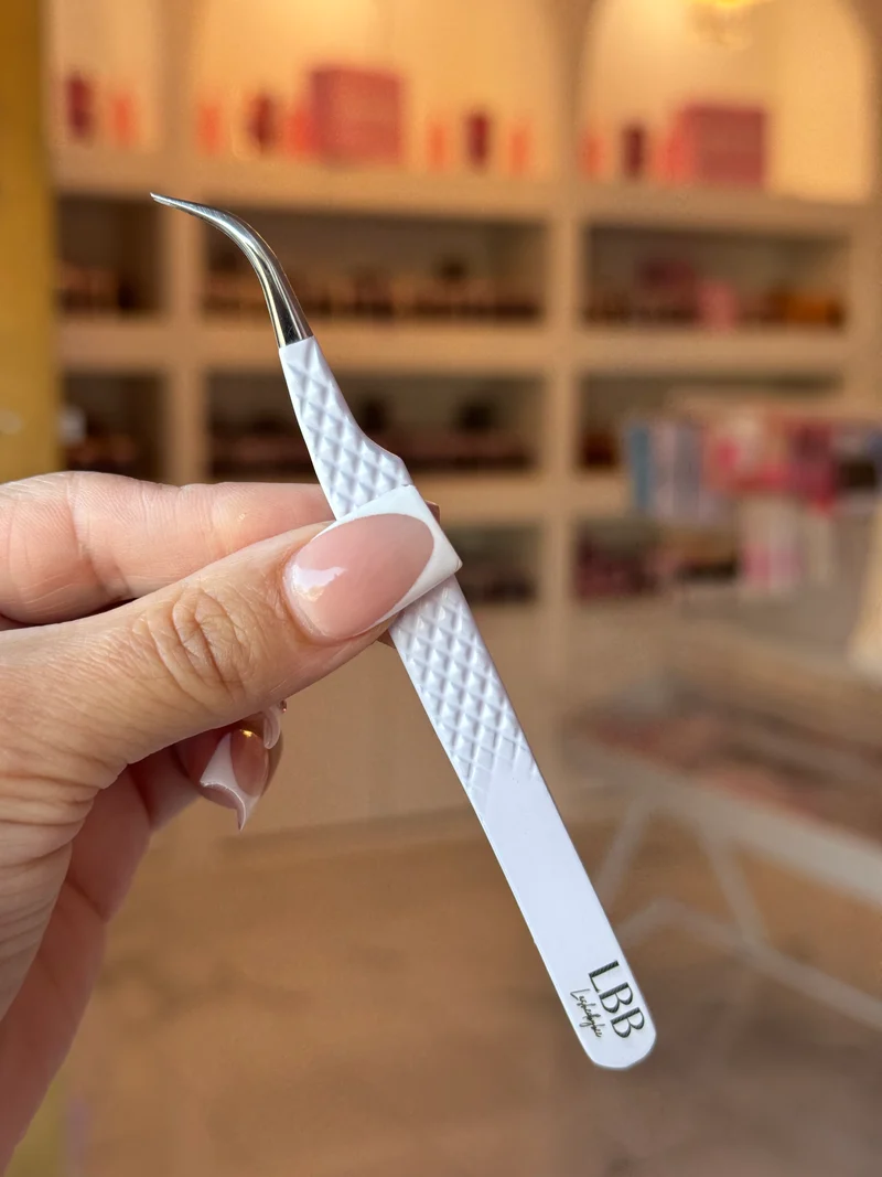 White J curve tweezer