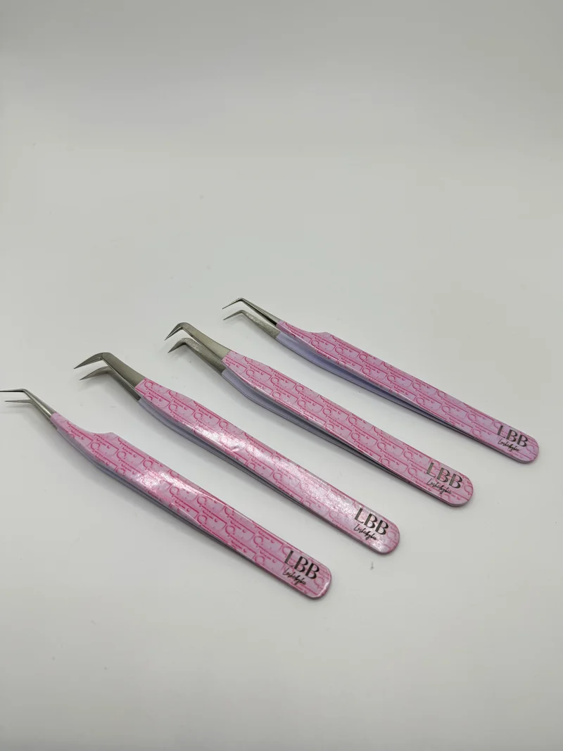 Dior pink tweezers